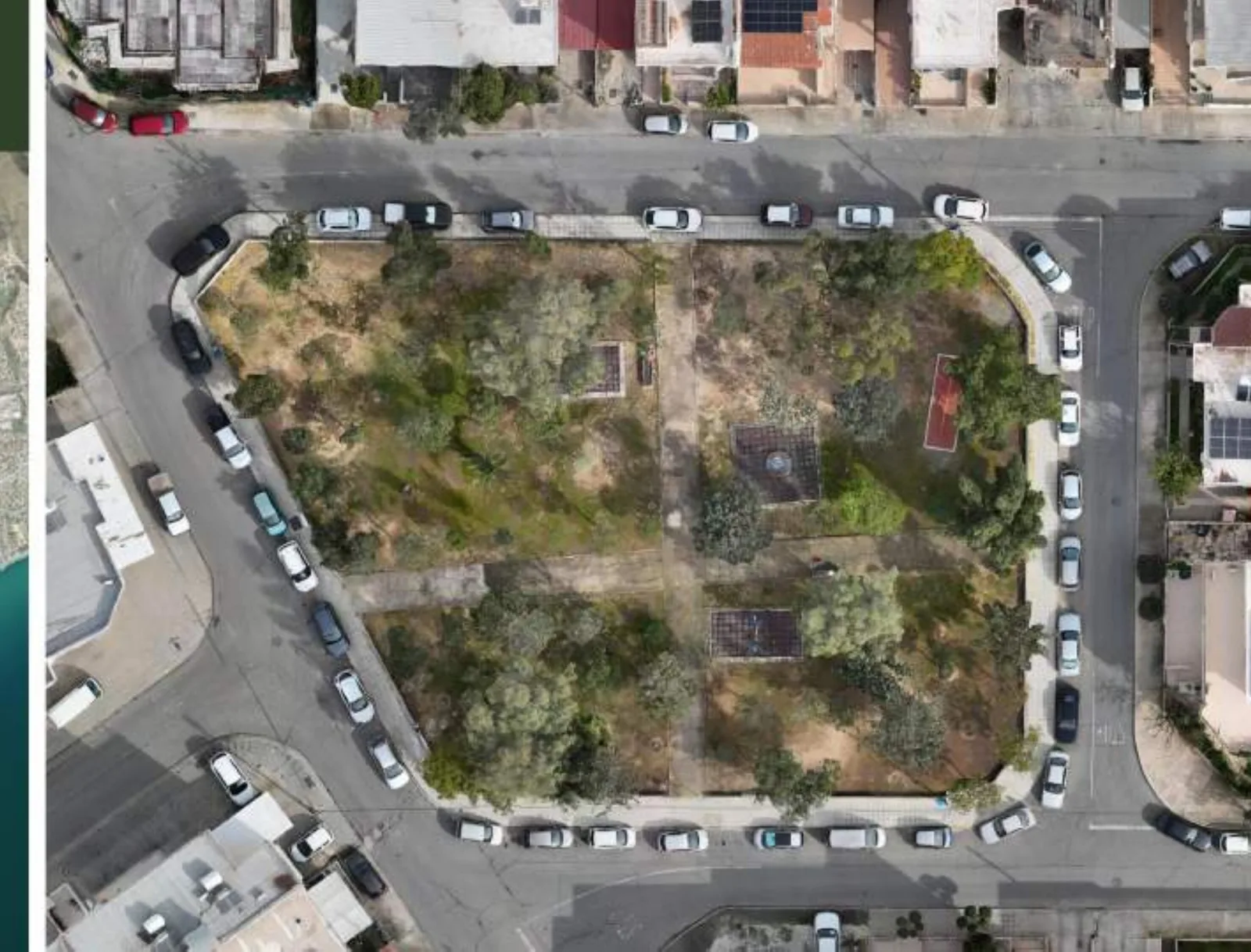 Aerial view of the Omonoia square in Limassol, ringed by parked cars on all four sides